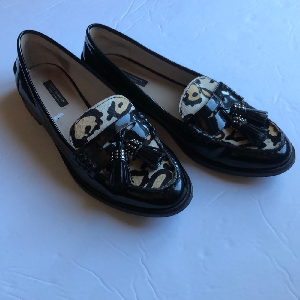 Black shiny animal print tassel shoes, size 38.
